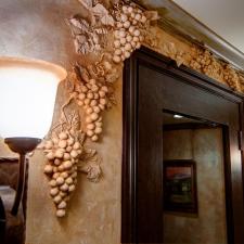 Faux Chiseled Grape Motif added around this wine room entry2